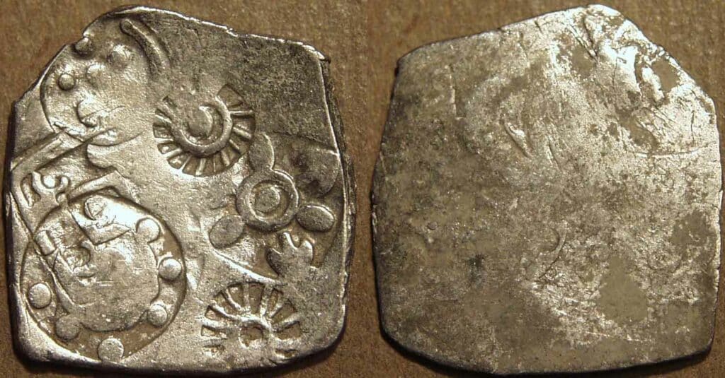 A Magadha Coin five symbols